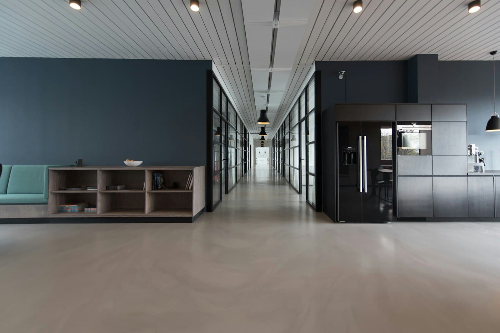A modern office corridor with connected workspaces